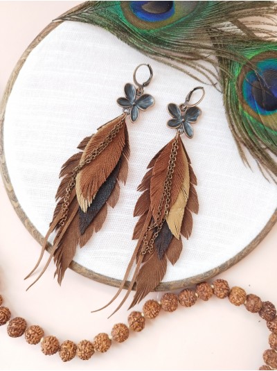 Brown leather feather earrings with chain.