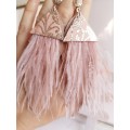Multi layered earrings made from genuine leather and real feathers.