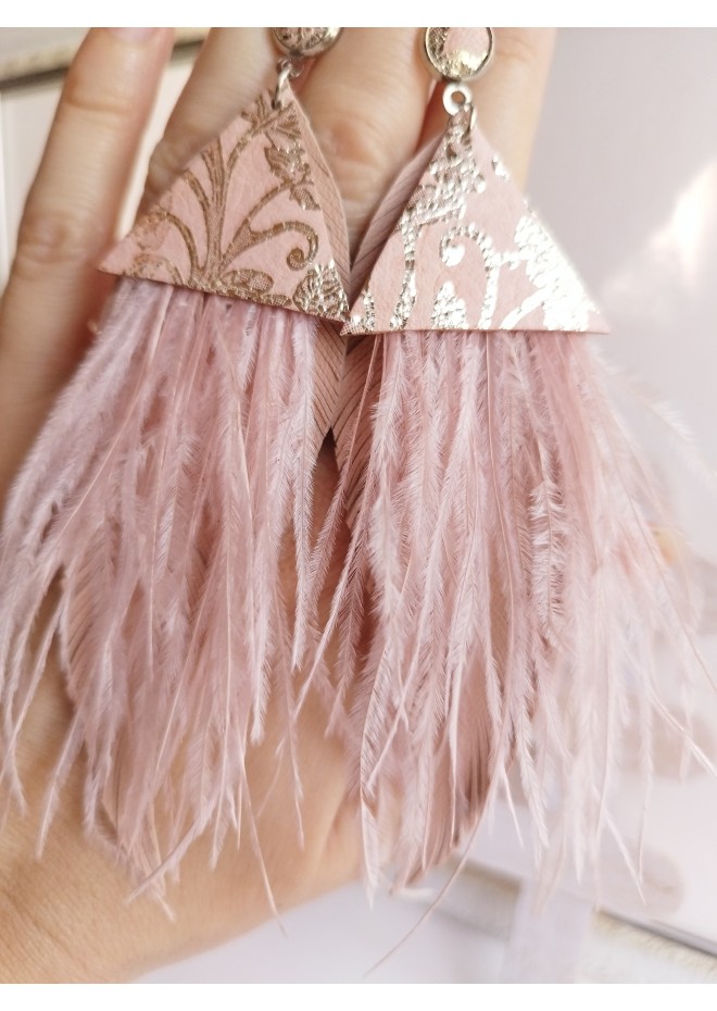 Multi layered earrings made from genuine leather and real feathers.
