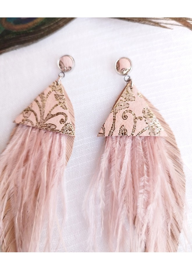 Multi layered earrings made from genuine leather and real feathers.