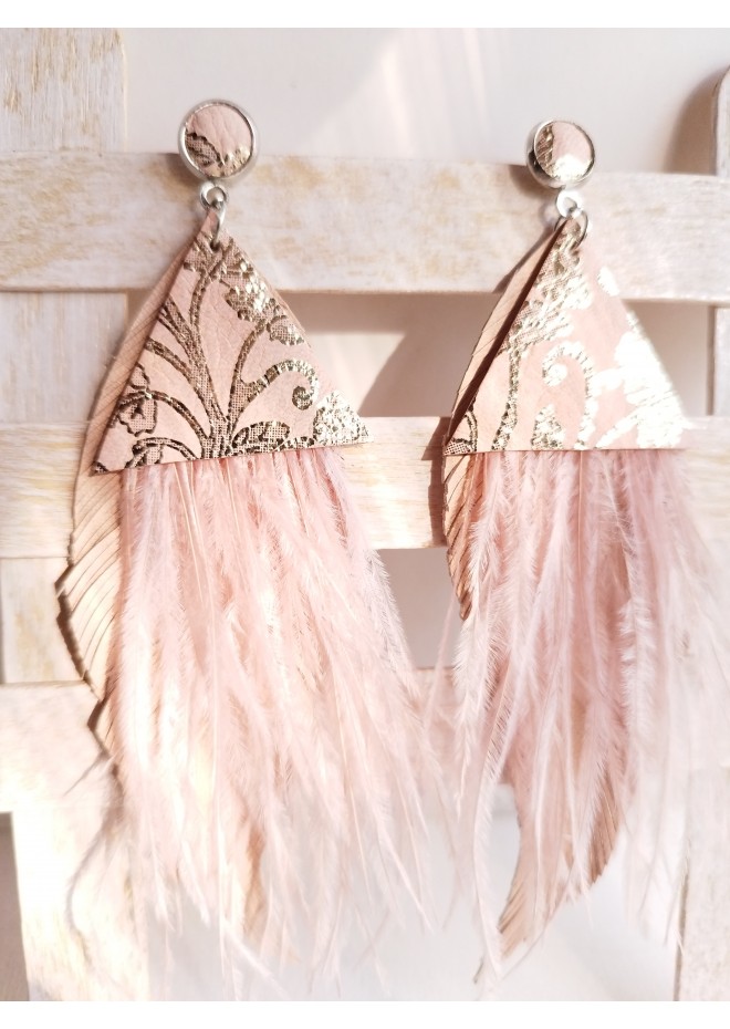 Multi layered earrings made from genuine leather and real feathers.