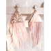 Multi layered earrings made from genuine leather and real feathers.