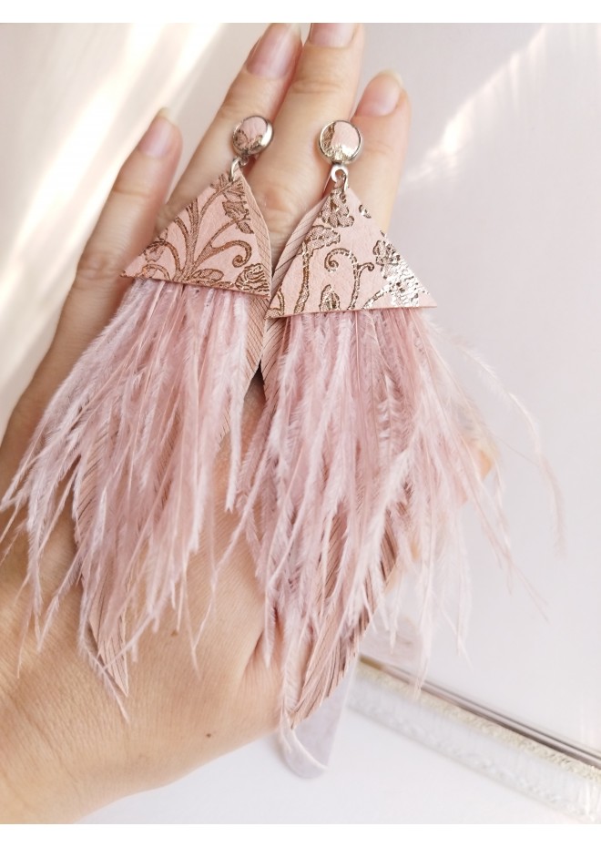 Multi layered earrings made from genuine leather and real feathers.