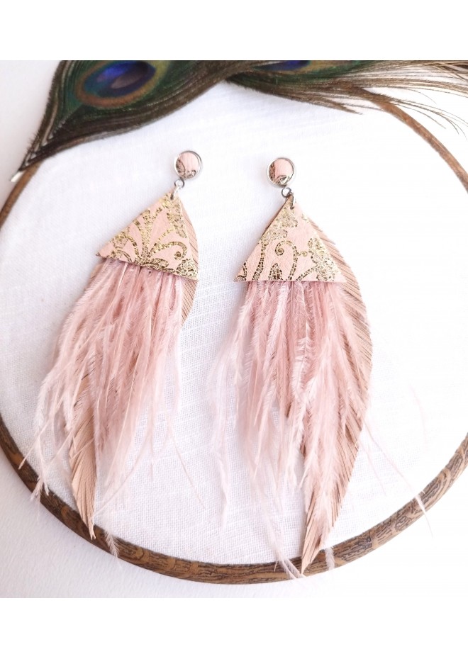 Multi layered earrings made from genuine leather and real feathers.