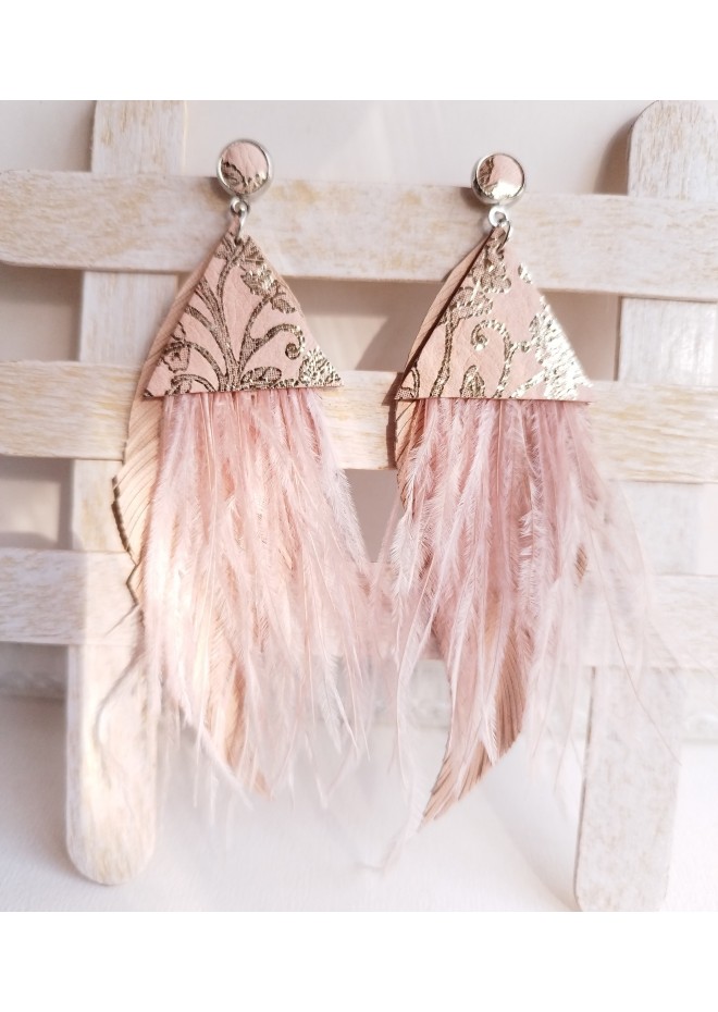 Multi layered earrings made from genuine leather and real feathers.