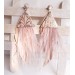 Multi layered earrings made from genuine leather and real feathers.