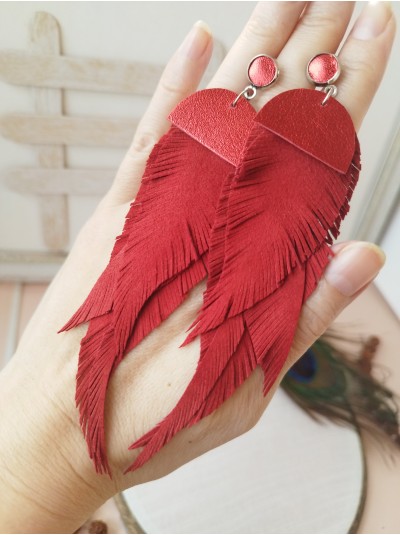 Red extra long suede feather earrings. 