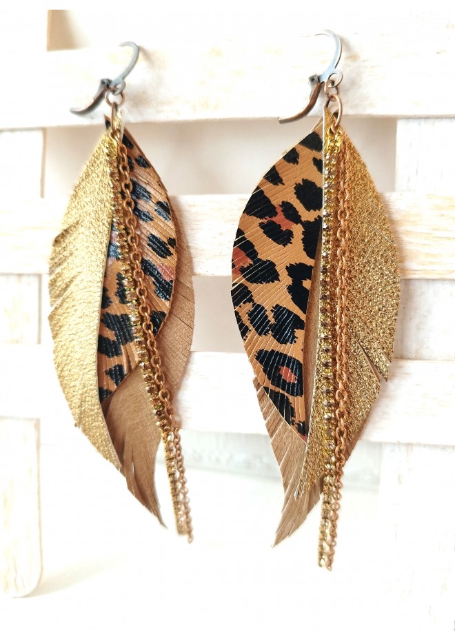 Unique high quality hand cut genuine leather feather earrings.