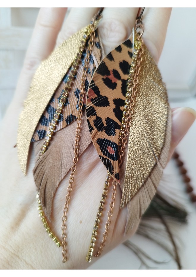 Unique high quality hand cut genuine leather feather earrings.
