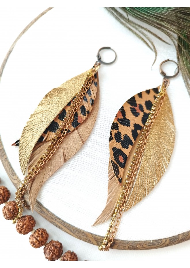 Unique high quality hand cut genuine leather feather earrings.