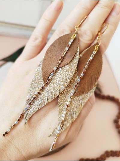 Sand brown gold with crystal chain leather feather earrings.