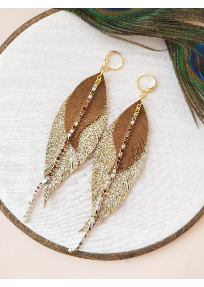 Unique high quality hand cut genuine leather feather earrings.