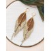 Unique high quality hand cut genuine leather feather earrings.