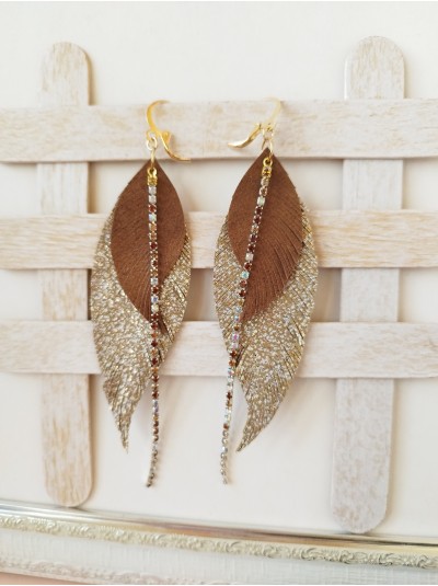 Sand brown gold with crystal chain leather feather earrings.