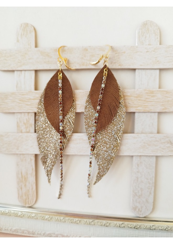 Unique high quality hand cut genuine leather feather earrings.