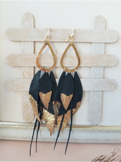 Black gold extra long leather feather earrings.