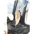 Unique high quality hand cut genuine leather feather earrings.