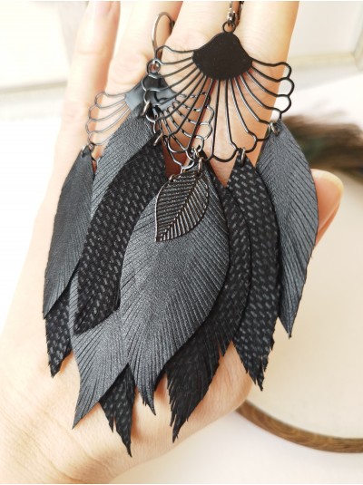 black long leather feather earrings.