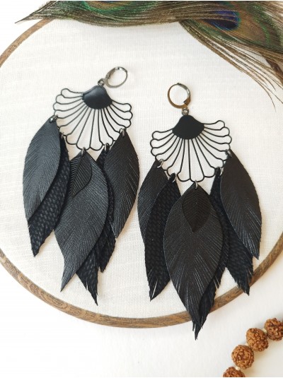 black long leather feather earrings.