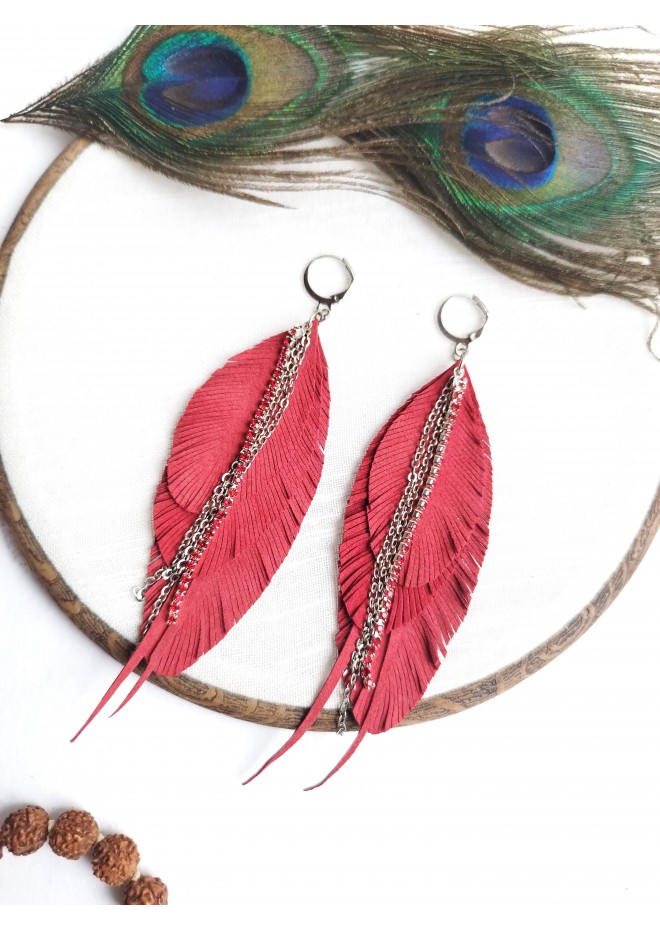 Unique high quality hand cut genuine leather feather earrings.