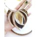 beige brown leather feather necklace