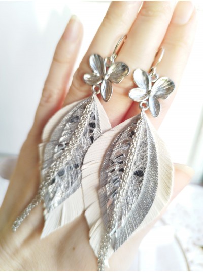 white silver leather feather earrings with chain. 