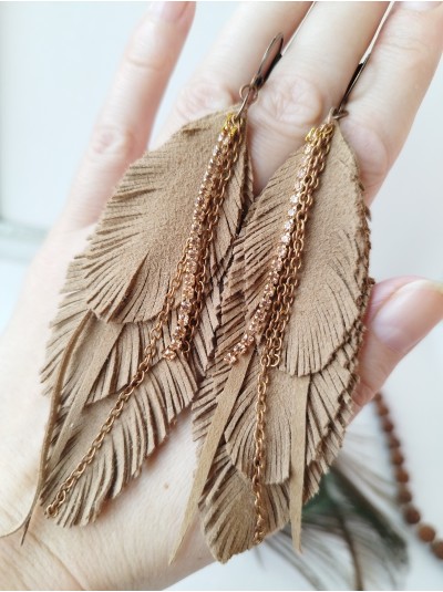 Soft beige with chain leather feather earrings.