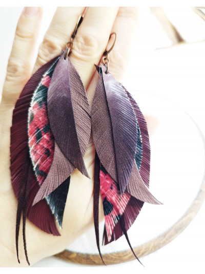 Maroon leather feather earrings.  