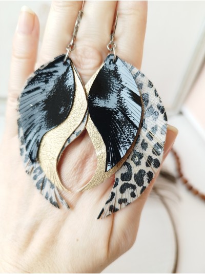Black gold leopard print leather wings earrings.